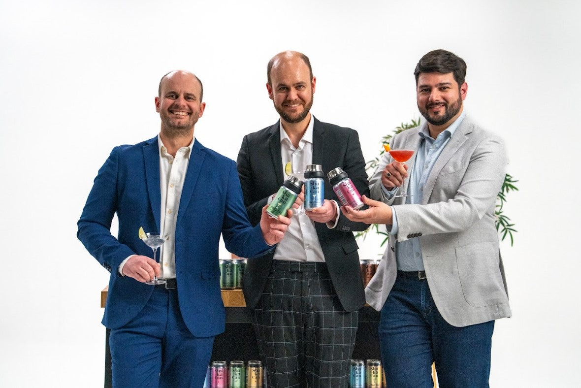 The Founders of ShakaCan Cocktails: CPO Andrew Nicholls, CEO Richard Nicholls, and CMO Diego Salvatierra - toasting with three ShakaCan cocktails (Daiquiri, Pegu Club, & Grapefruit Cosmo).